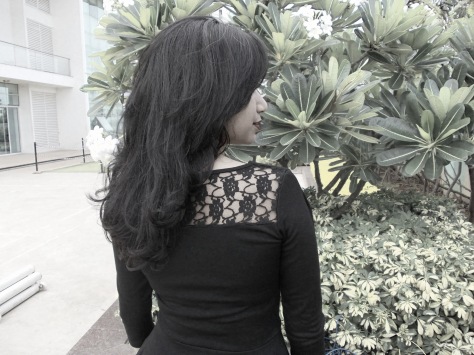 Lace design on the backside of the peplum top
