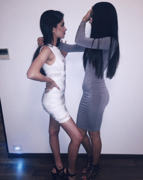 Khushi seen with her friend (on left) was subjected to bad comments as her stomach popped out of a bodycon dress